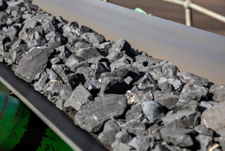 Close,Up,Of,Manganese,Ore,On,A,Conveyor,Belt